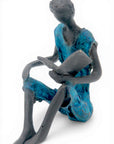 Bronze assis à poser 25 cm bleu n°3