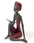 Bronze assis à poser 55 cm rouge n°1 Bronzes d'Afrique