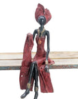 Bronze assis 35 cm rouge n°1 Bronzes d'Afrique